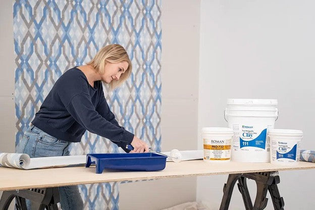 DIYer Installing Wallpaper