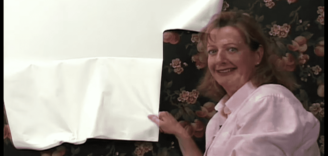 Woman Pulling Wallpaper from the Wall
