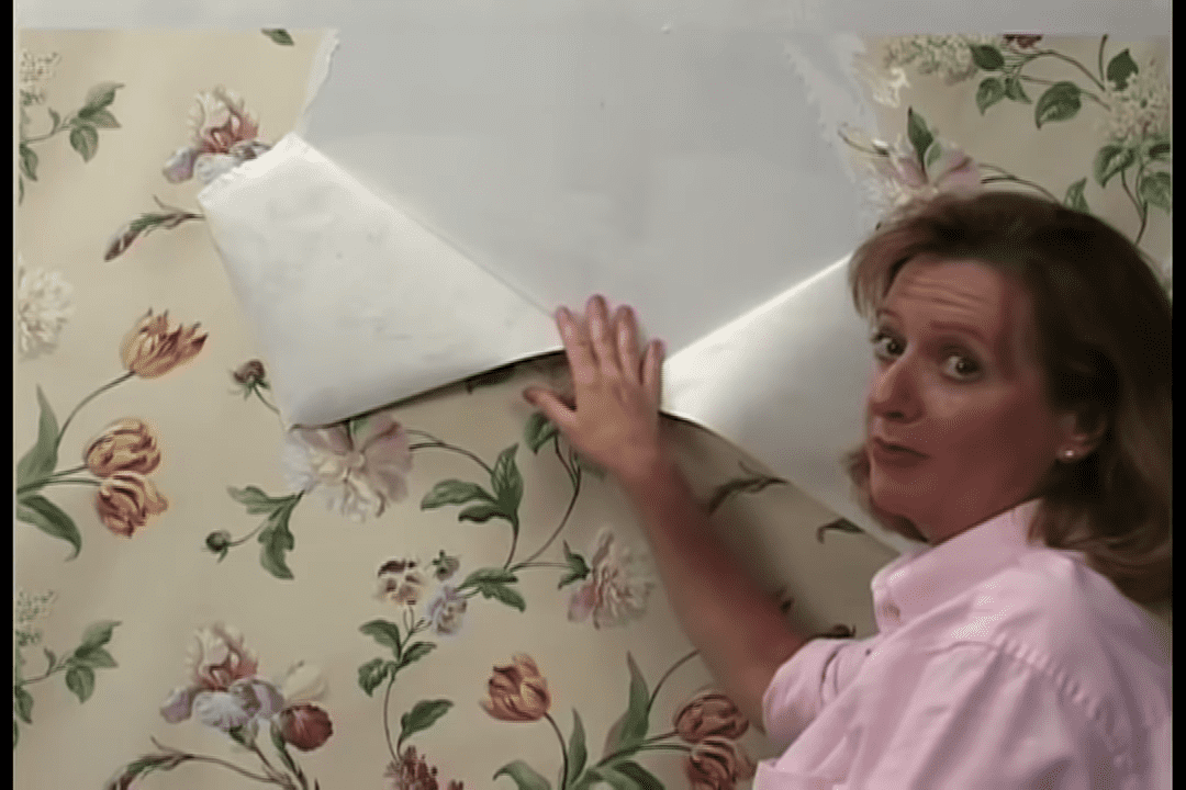 Woman Removing Wallpaper