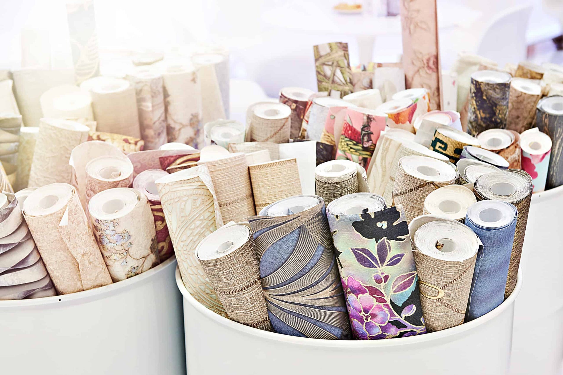 Various wallpaper patterns in a bag.